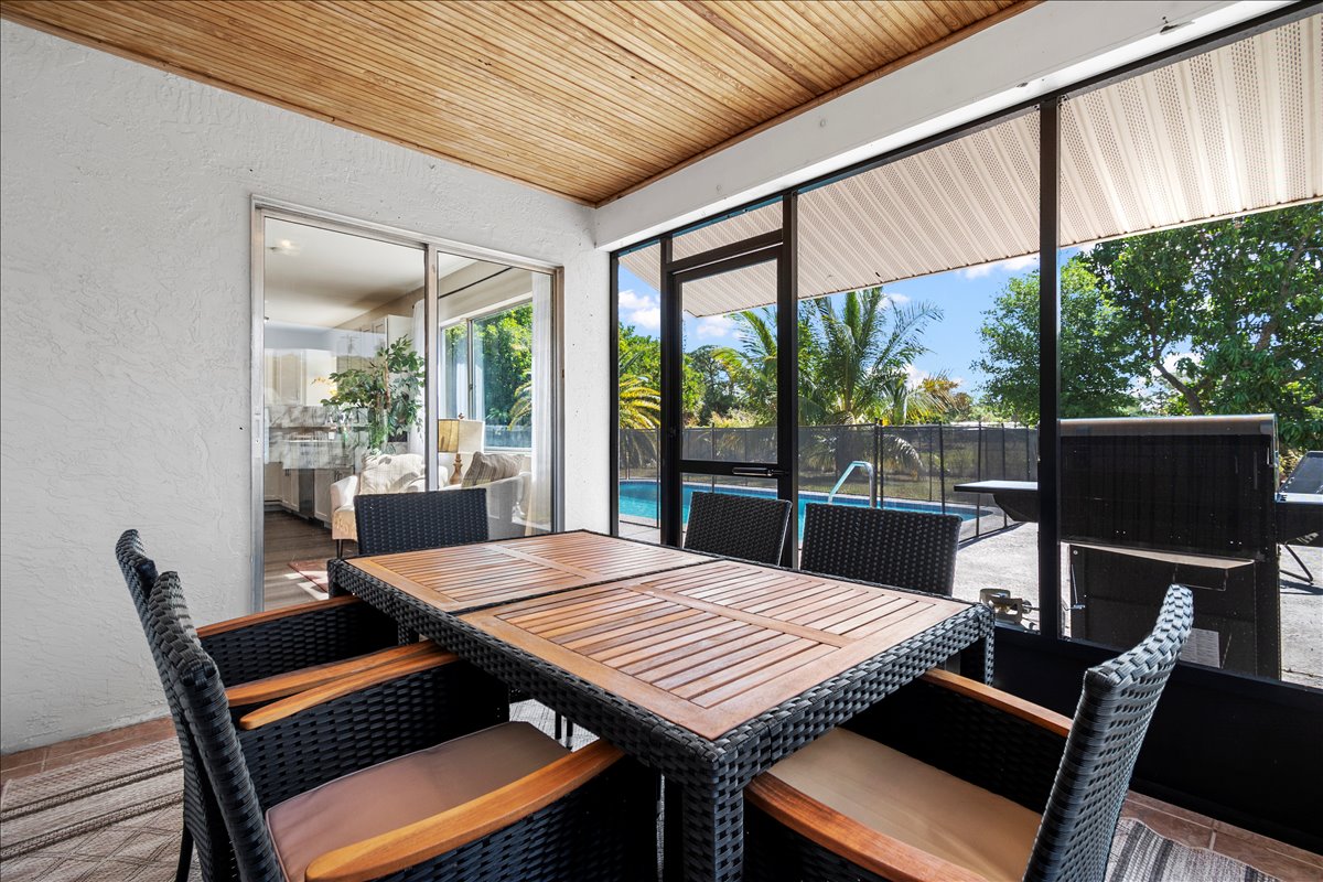 Screened lanai with pool view